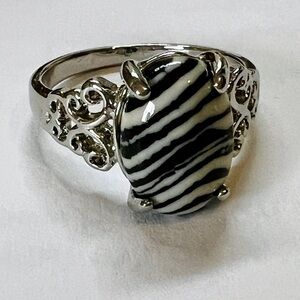 Black and Silver Art Nouveau Ring with Intricate Metalwork